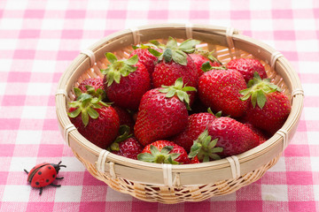 strawberry that was served in a bamboo basket