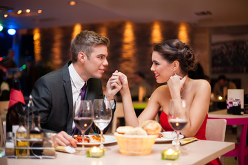 couple flirting at restaurant