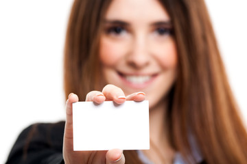 Business woman holding a blank card