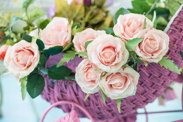 Artificial rose in the basket