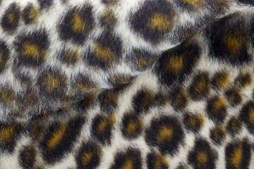 close up shot of fake leopard tiger fur texture background