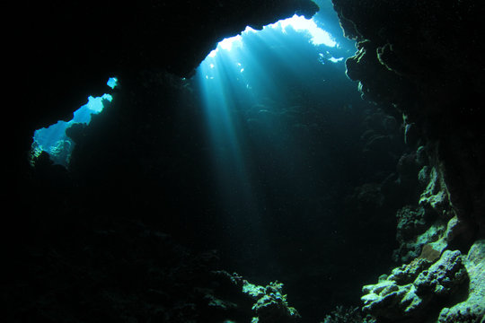 Fototapeta Sunlight in underwater cave