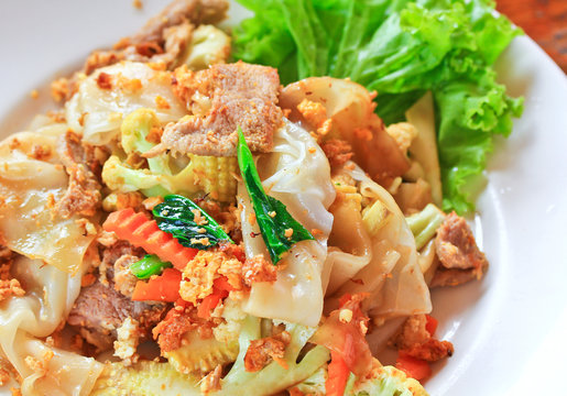 Stir fried noodles with egg and pork, Thai food
