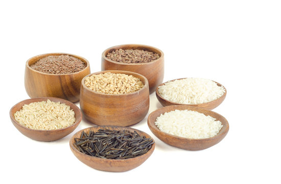 Wooden bowls of legumes, grains and rice