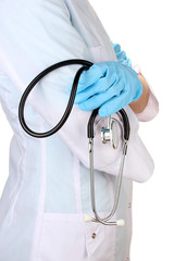 Doctor with  stethoscope in hand. isolated on white