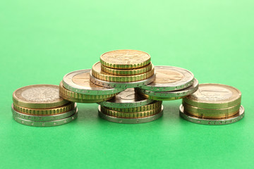 euro coins on color background