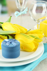 Spring table serving on bright background