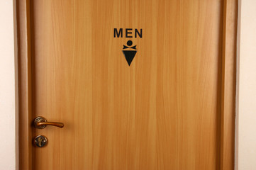 Fototapeta premium Toilet sign on wooden door