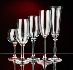 Collection of wine glasses, on dark color background