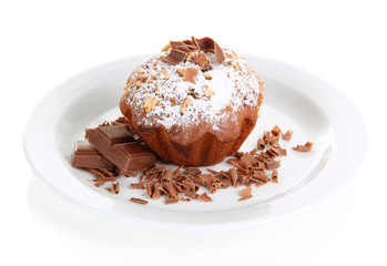 Tasty muffin cake with powdered sugar and chocolate