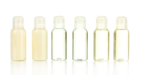Hotel cosmetic bottles isolated on white