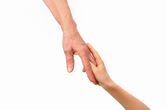 Grandmother and grandchild tenderly holding hands