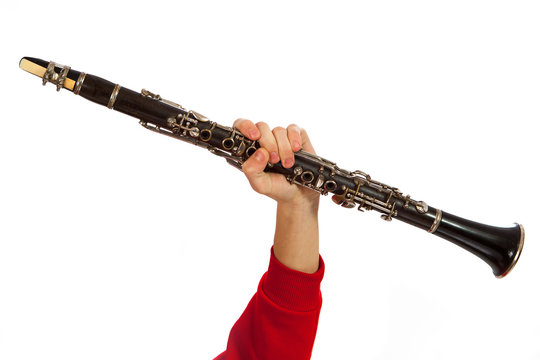 Hand holding clarinet