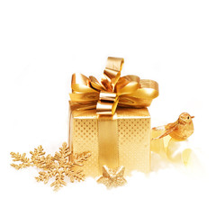 Gold gift with christmas decoration