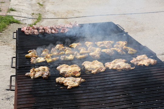 grid of a giant outdoor barbecue for grilling chicken and pork
