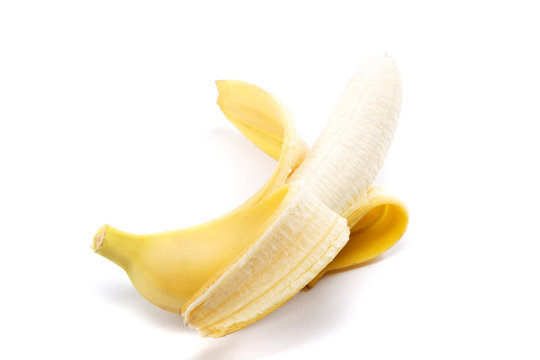 Opened banana isolated on white background.