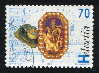 Ring with mechanical figures and musical movement
