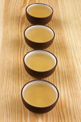 Chinese traditional teacups with green tea