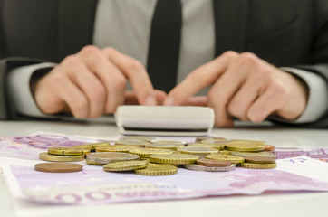 Financial adviser calculating