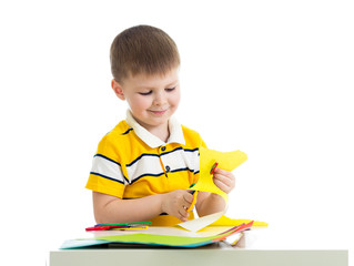 kid boy cut paper © Oksana Kuzmina