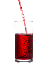 Stream of juice flows in a glass