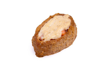 Nigiri Inari with a salmon in sauce
