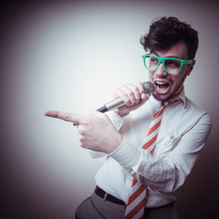 funny stylish businessman singing