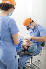 Dentist during a teeth examination