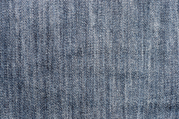 Naklejka premium Jeans fabric as background or texture