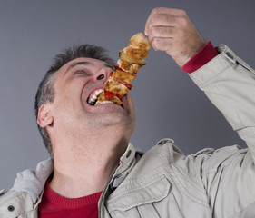 Hungry meat-eating man,  ravenous expression