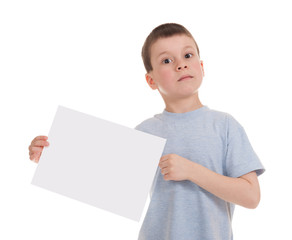 smiled boy with blank sheet paper