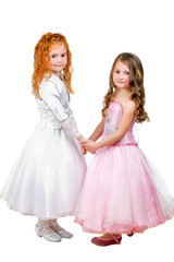 Fototapeta na wymiar Little girls in nice dresses