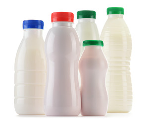 Composition with plastic bottles of milk products