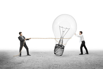two man pulling lamp