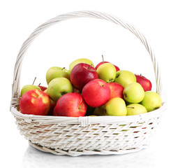 juicy apples in basket, isolated on white
