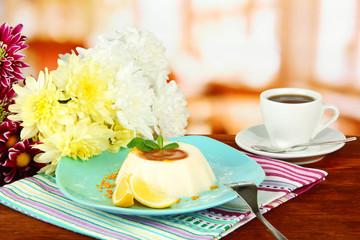 Panna Cotta with orange zest and caramel sauce,