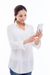 Young Asian woman using a smart phone.