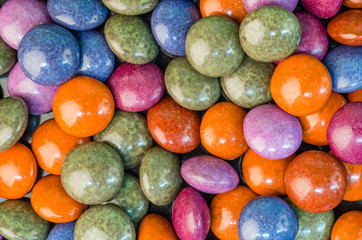 Colorful chocolate candies on table