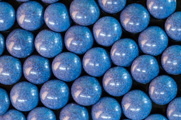 Colorful chocolate candies on table