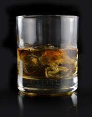 whiskey with ice in a glass