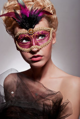 Beautiful woman in Venetian mask