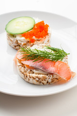 Appetizers with red fish and red caviar