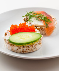 Appetizers with red fish and red caviar