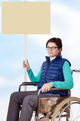 Wheelchair user, demonstrates for their situation