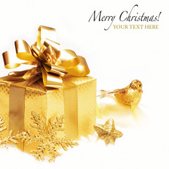 Gold gift with christmas decoration