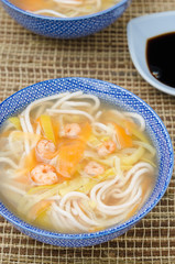 Chinese soup with noodles and vegetables top view