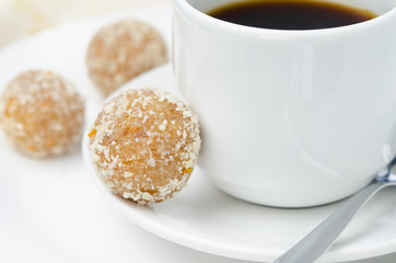 Homemade candy made of almonds, ginger and dates