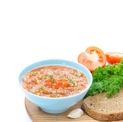 tomato soup with buckwheat groats in a bowl isolated