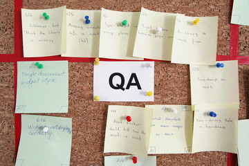 Quality assurance section with paper tickets on kanban