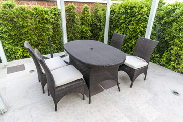 chairs and table near garden - garden furniture